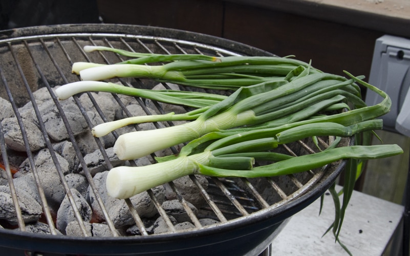 raw calcots on the grill