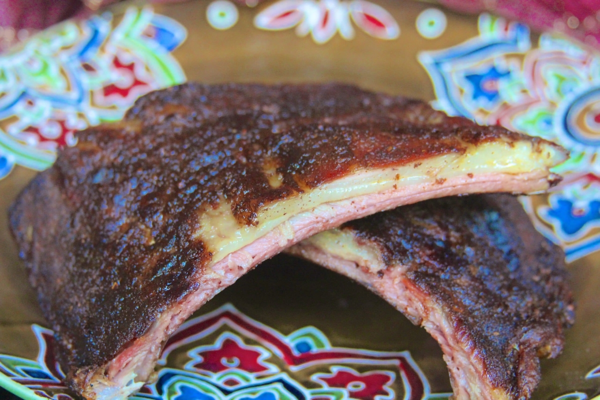 Smoked dry rubbed lamb ribs plated