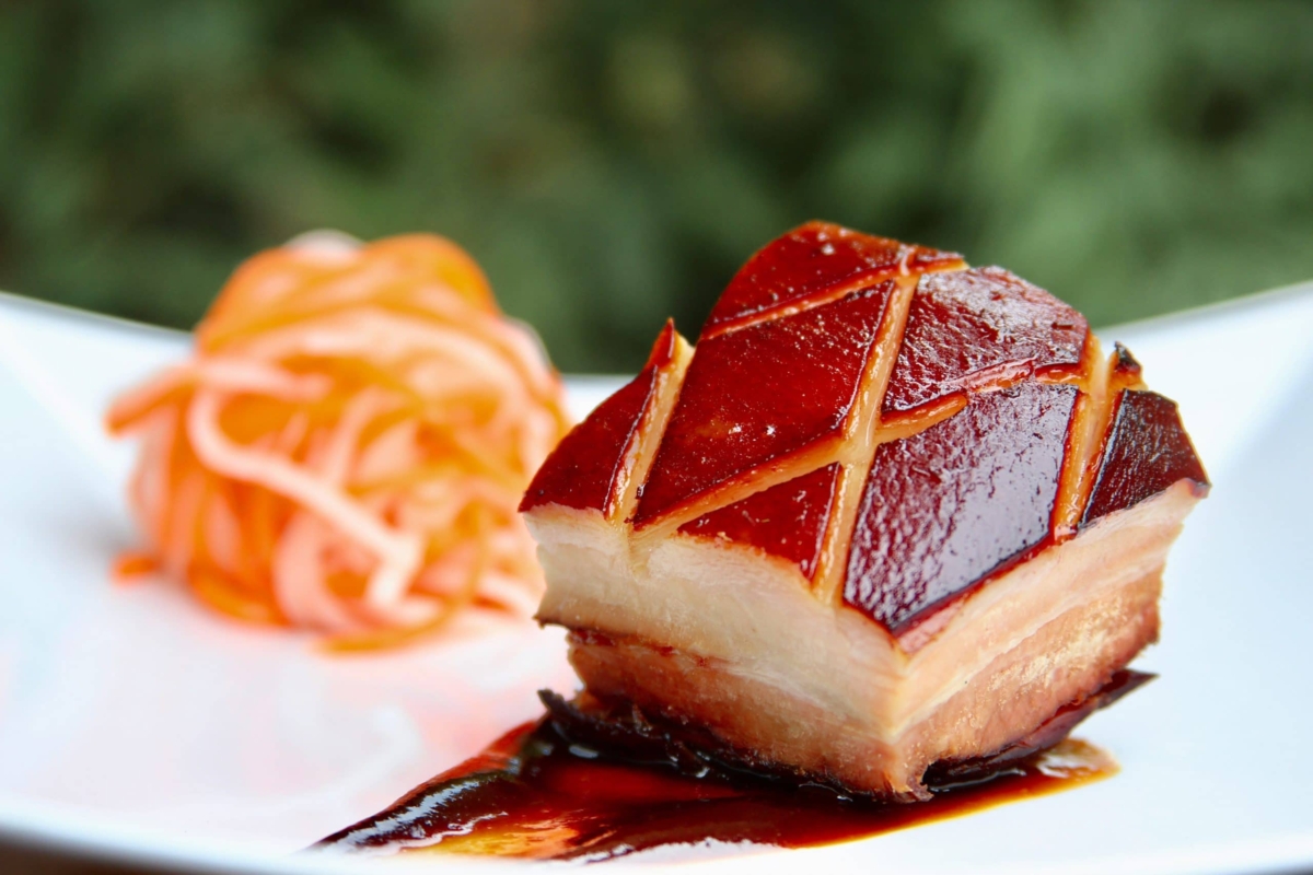 Sous vide and smoked pork belly slice plated