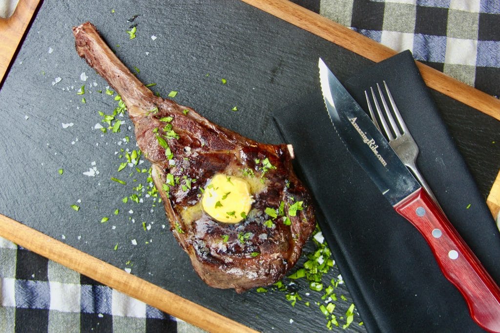 Grilled cowboy bison ribeye plated