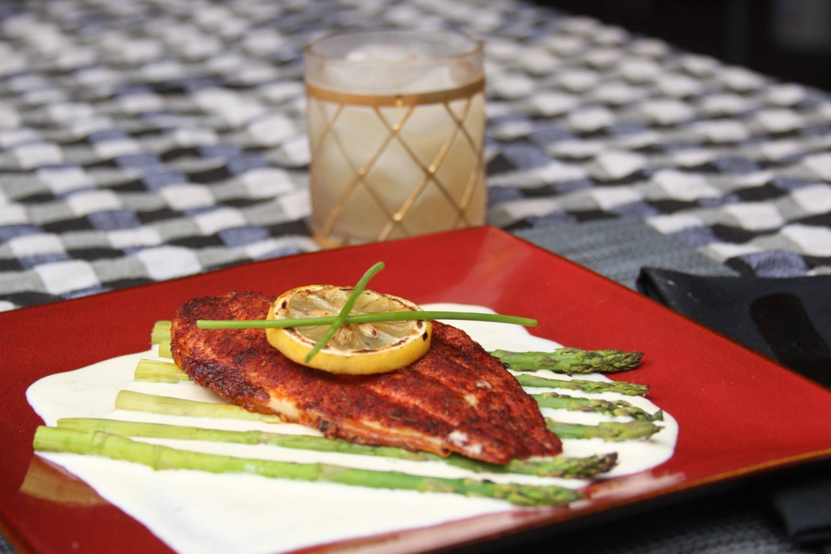 Grilled catfish sauced and plated