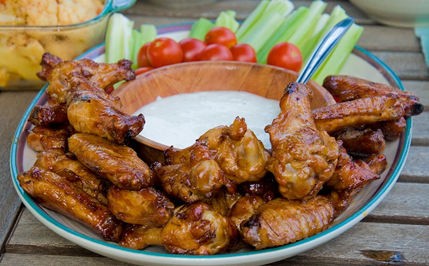 buffalo chicken wings in a bowl.