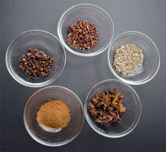 five spices in five containers