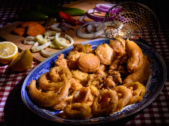 Platter filled with tempura battered fried vegetables