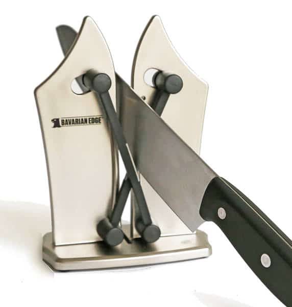 sharpening rods with knife being sharpened in rods