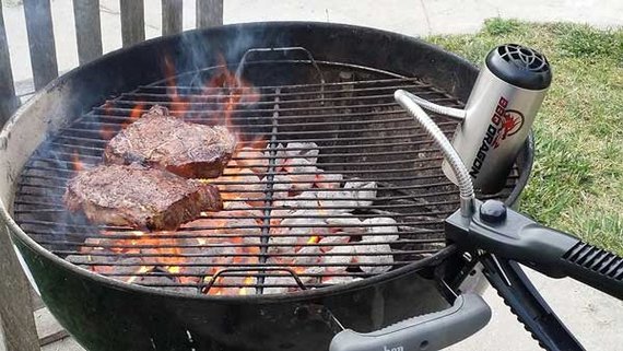 barbecue dragon lighting coals