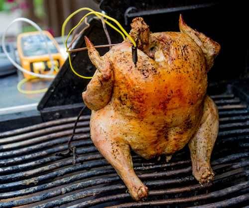 chicken cooking on grill