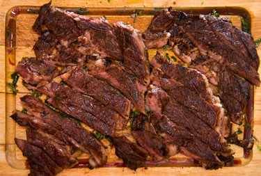 thin steak with board sauce