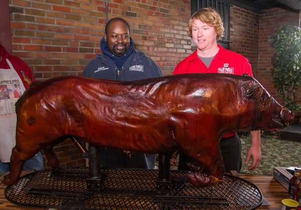 Brad Orrison with a whole hog