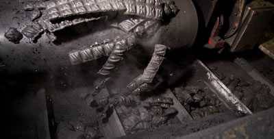strips of charcoal briquets in pillow shape