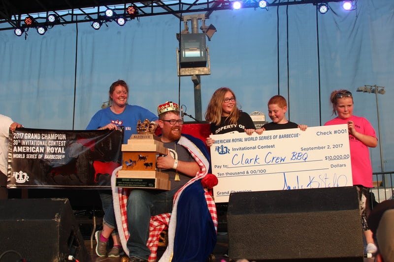 Clark Crew BBQ receiving trophy and check for winning the American Royal World Series of Barbecue