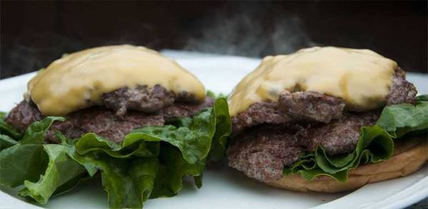 Double cheeseburgers on a plate