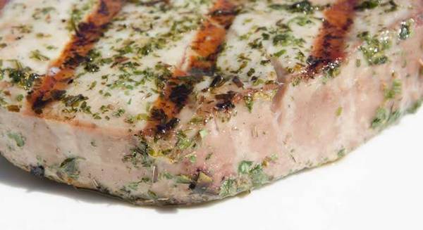 rub flavors a piece of fish