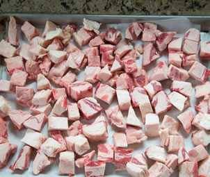 cubes of meat on a tray