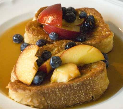 French toasted topped with fresh fruit