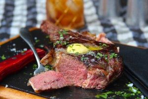 Bison ribeye steak plated