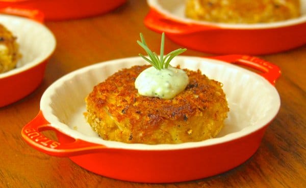 Griddle grilled crab cake topped with aioli