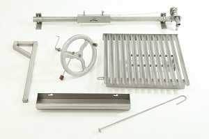 Various shiny stainless steel parts with a crank wheel in the center