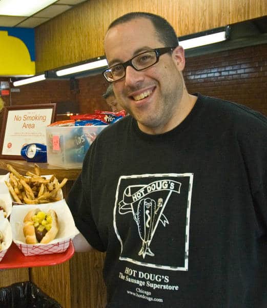 Man holding a hot dog