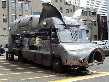 Bus tuned into a pigmobile