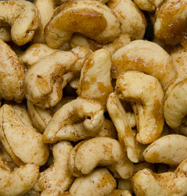 A pile of lightly glazed cashew nuts