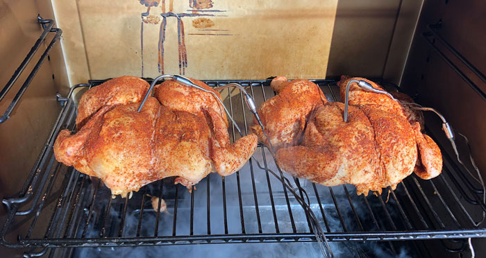 Pit Boss 5-Series chickens cooking