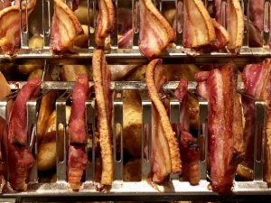 pork belly and bacon on grill