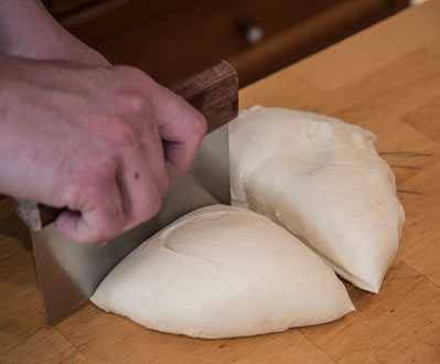 Cutting dough into portions