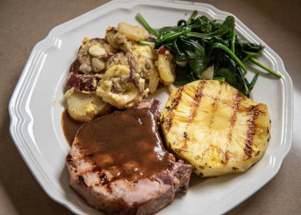 Grilled ham steak topped with redeye gravy
