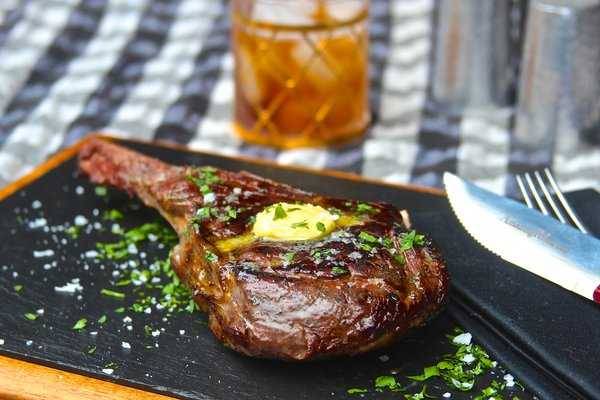 Butter poached bison ribeye plated