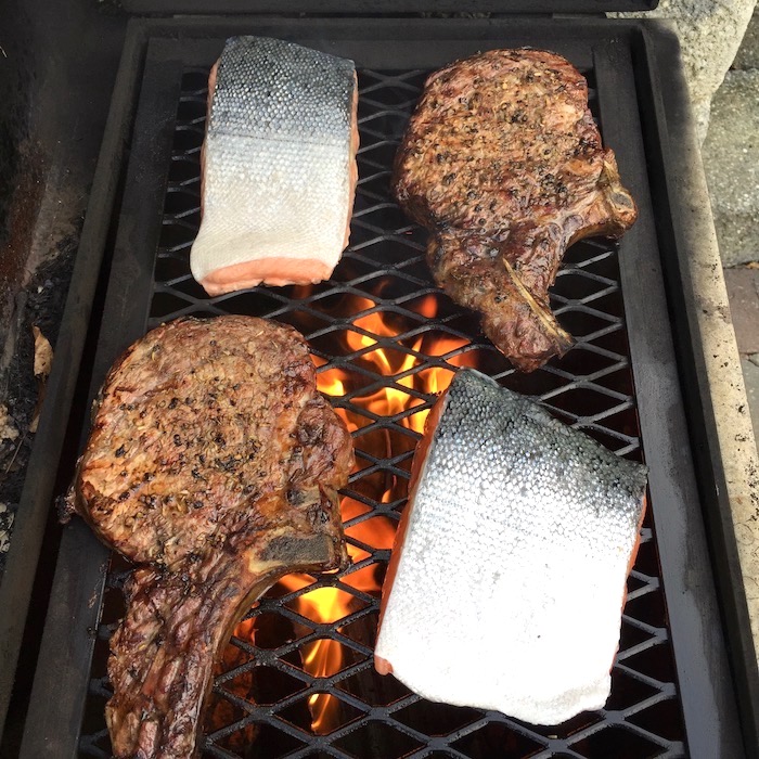 fish and meat on the grill