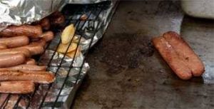 Hot dogs on a flattop grill