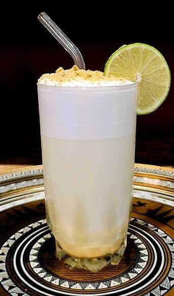 key lime pie cocktail in a glass.