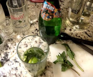 Mojito cocktail in the process of construction.