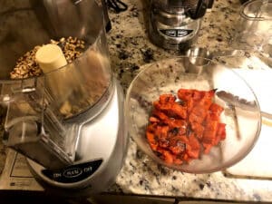 making grilled tomato pesto in a food processor.