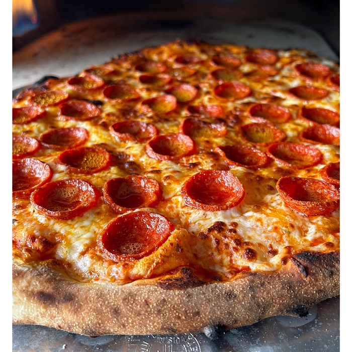 Finished pepperoni pizza cooked in the Arc XL pizza oven