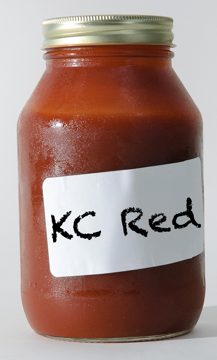 jar of red Kansas City BBQ sauce.