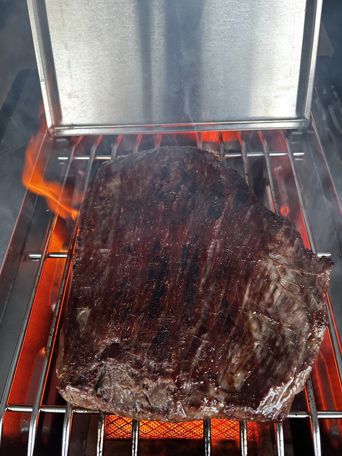 flank steak searing on grill sear burner