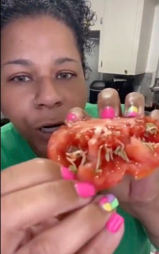 A person holding a tomato

AI-generated content may be incorrect.